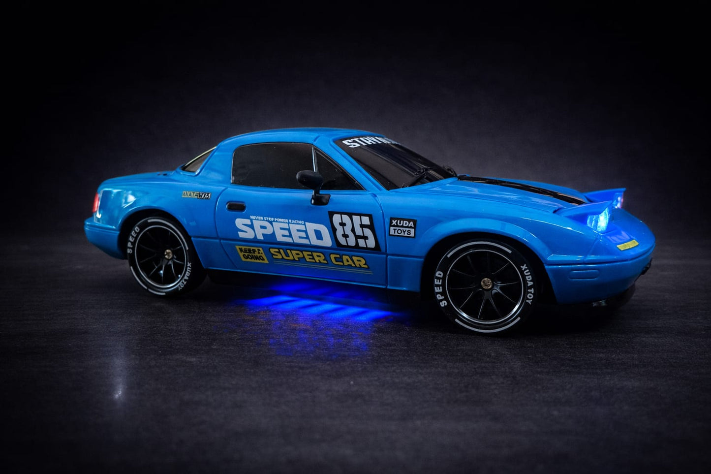 4WD  Speed Drift Racing X RC Car – 2.4GHz Remote Control Drift Car with Lights, Spare Tires & Road Blocks