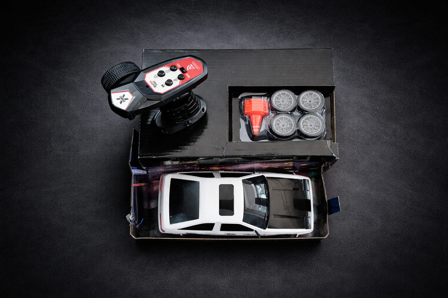 4WD  Speed Drift Racing X RC Car – 2.4GHz Remote Control Drift Car with Lights, Spare Tires & Road Blocks